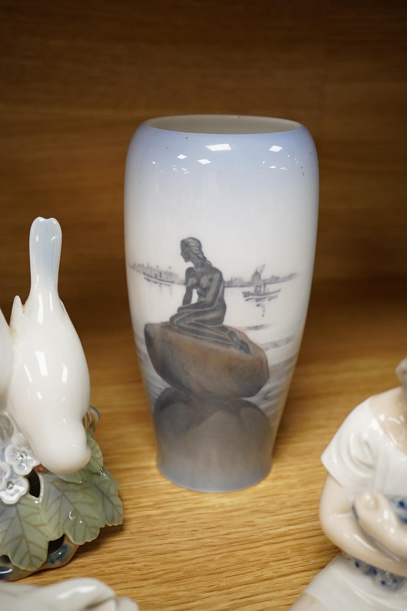 A group of Copenhagen, Nao and Lladro figures to include birds, together with a Royal Copenhagen vase, largest 21cm high